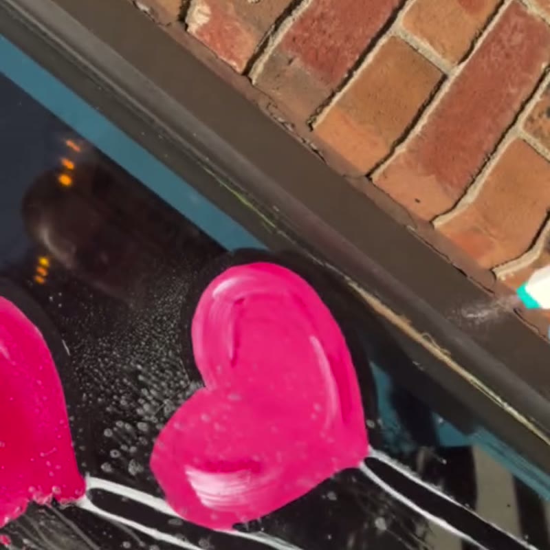 A Painted Momentz window mural in progress